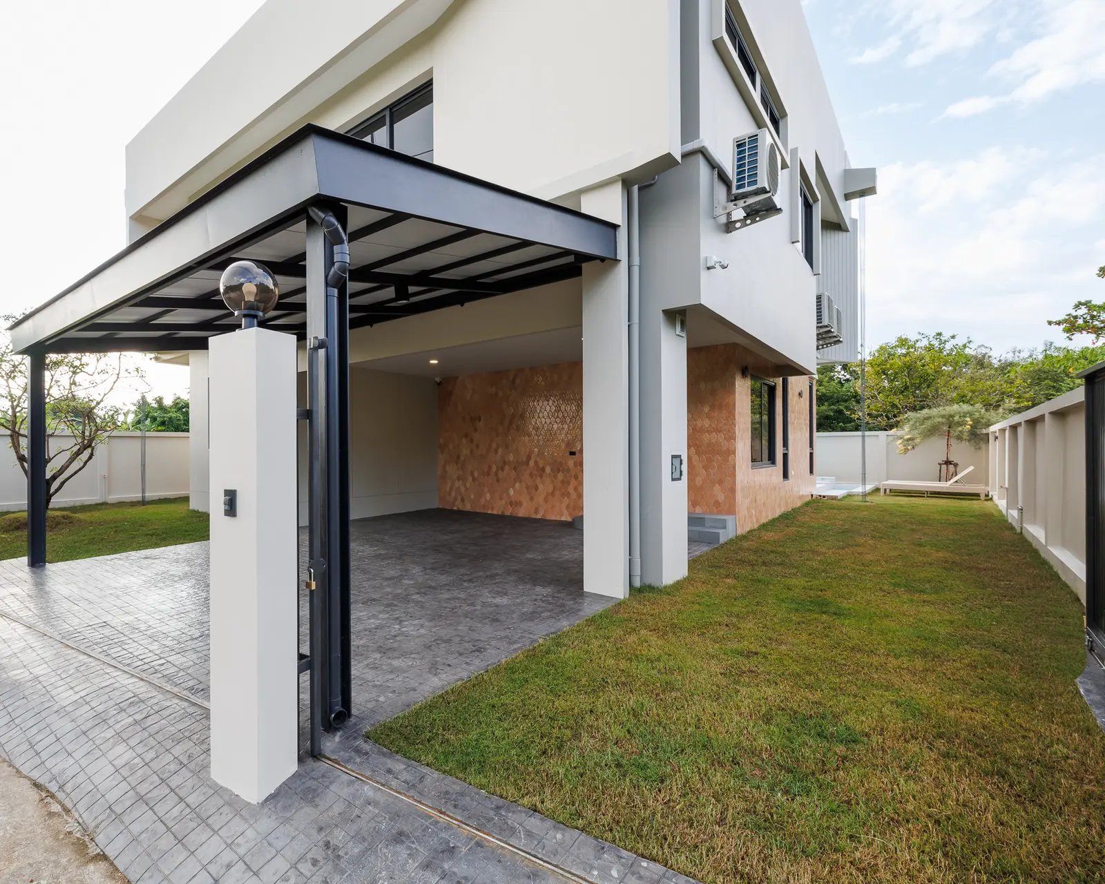 Private grounding lawn beside the mineral pool
